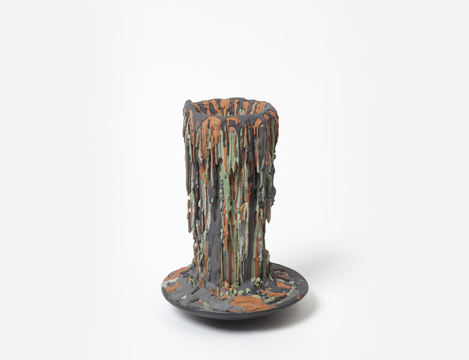 colored cement drip covered vase.