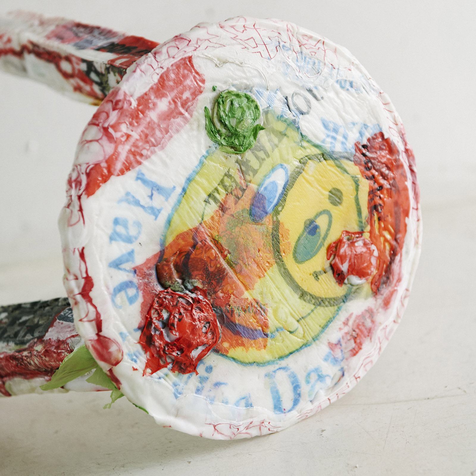 stool made from happy face plastic bags melted together