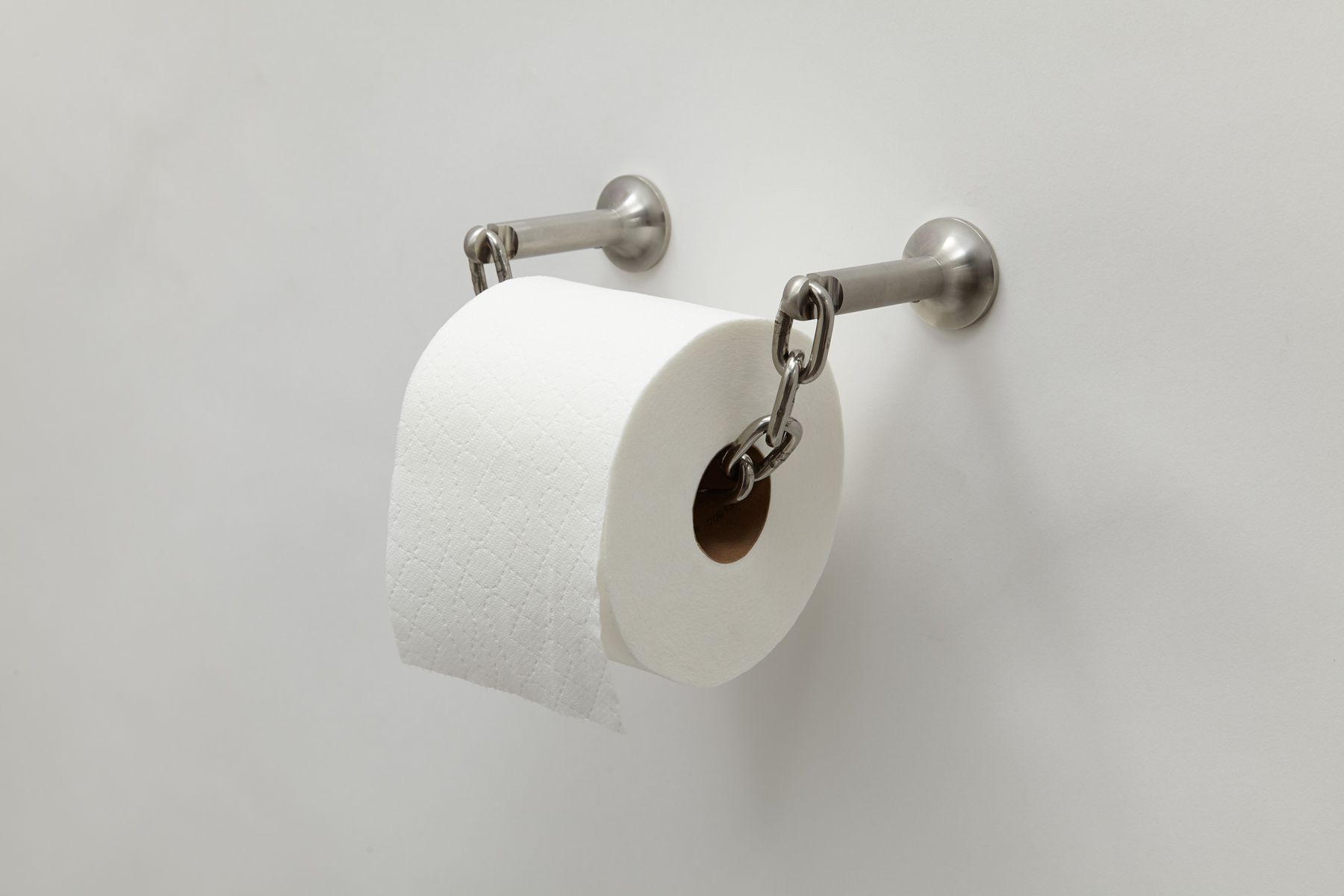 side view of wall mounted toilet paper holder made of chain connected by two steel rods.