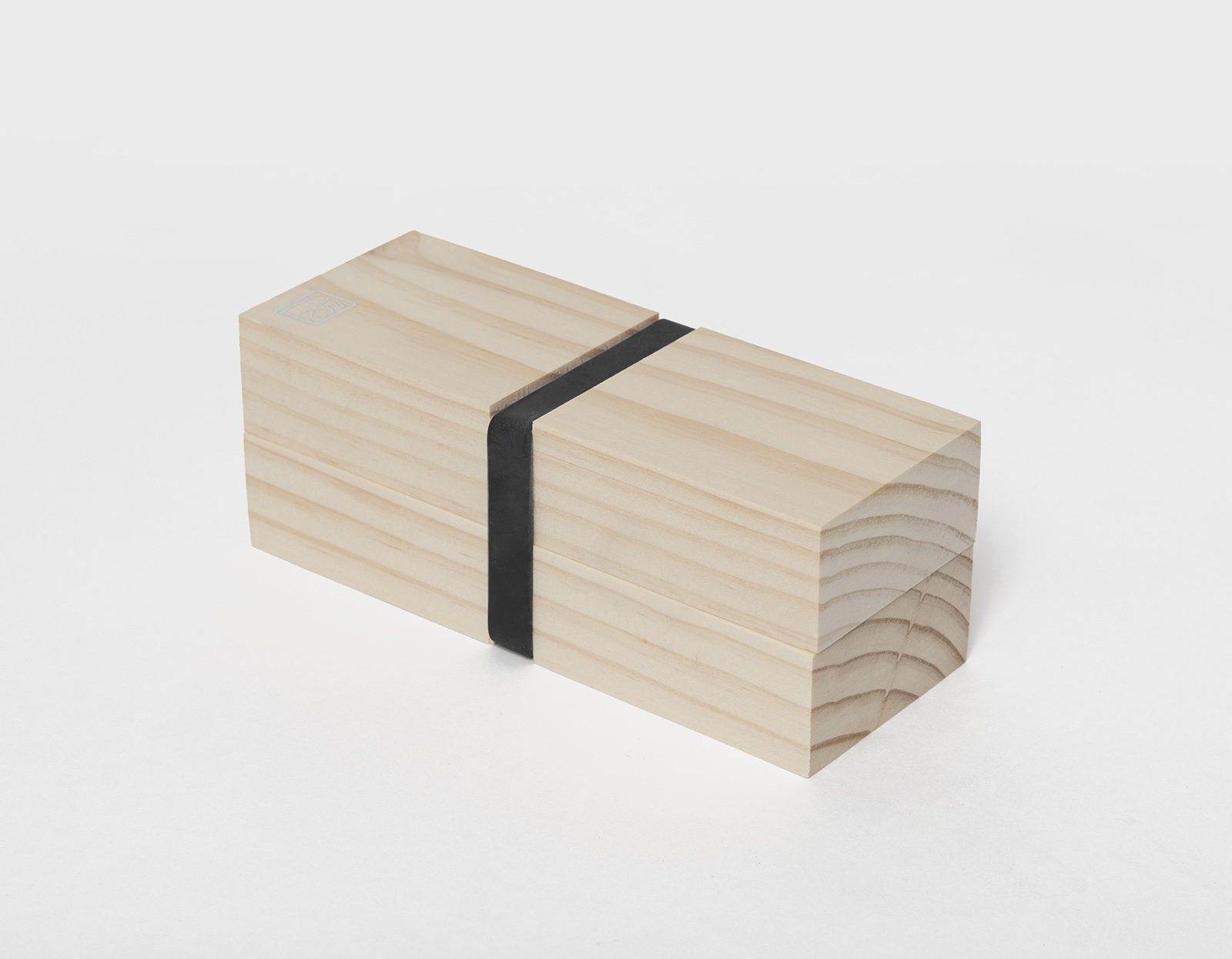 solid pine box with black rubber band closure