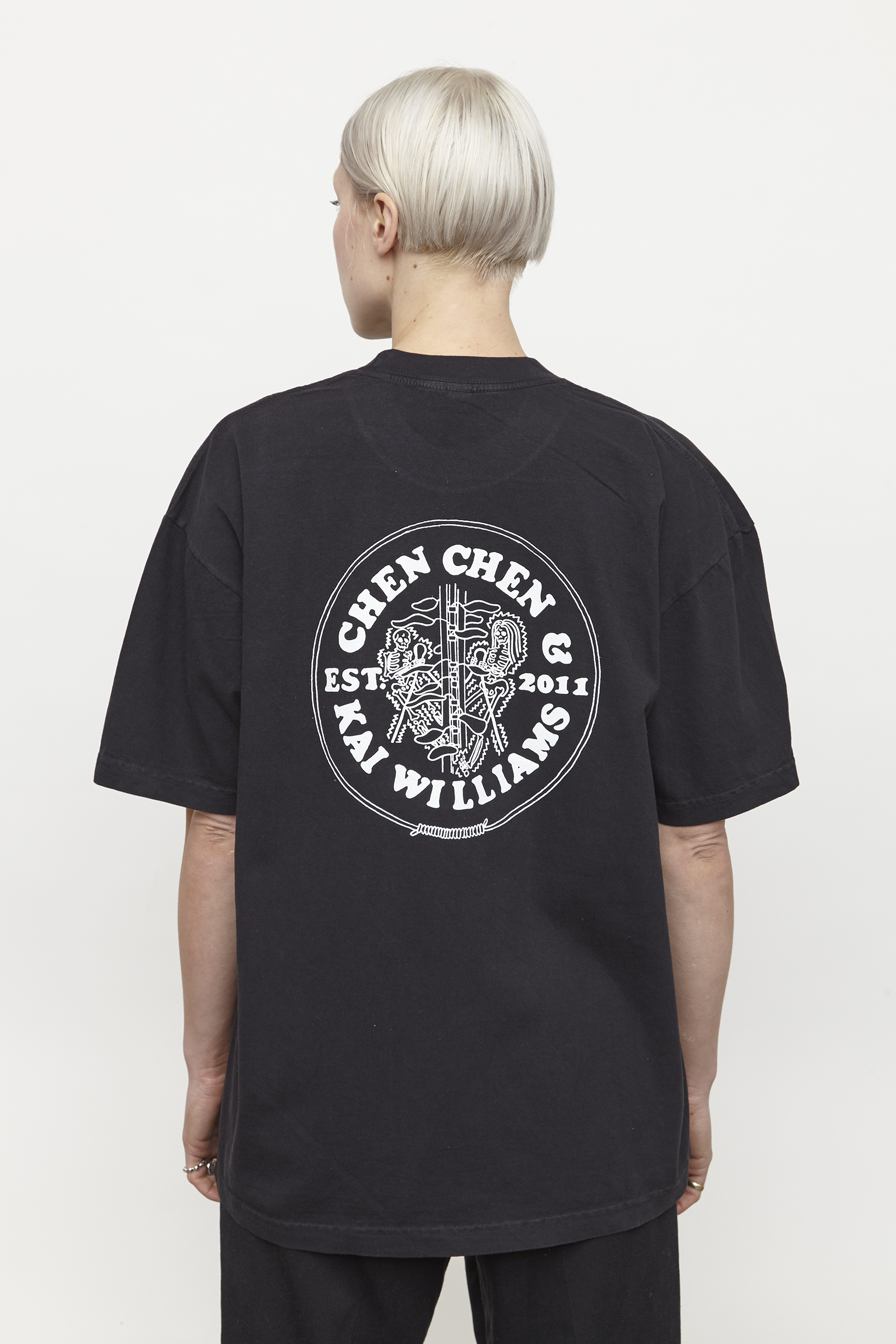 back of black t shirt with white graphics