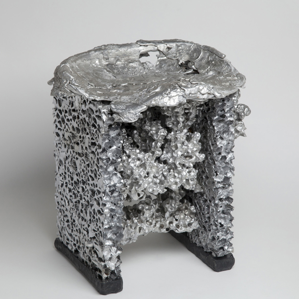 stool made from melted aluminum