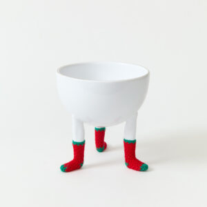 round bowl with 3 figurative legs wearing miniature christmas socks