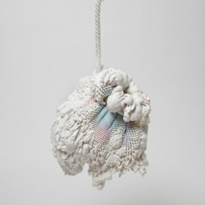 vase made of expanding foam coming out of gradient spandex netting coated in white rubber