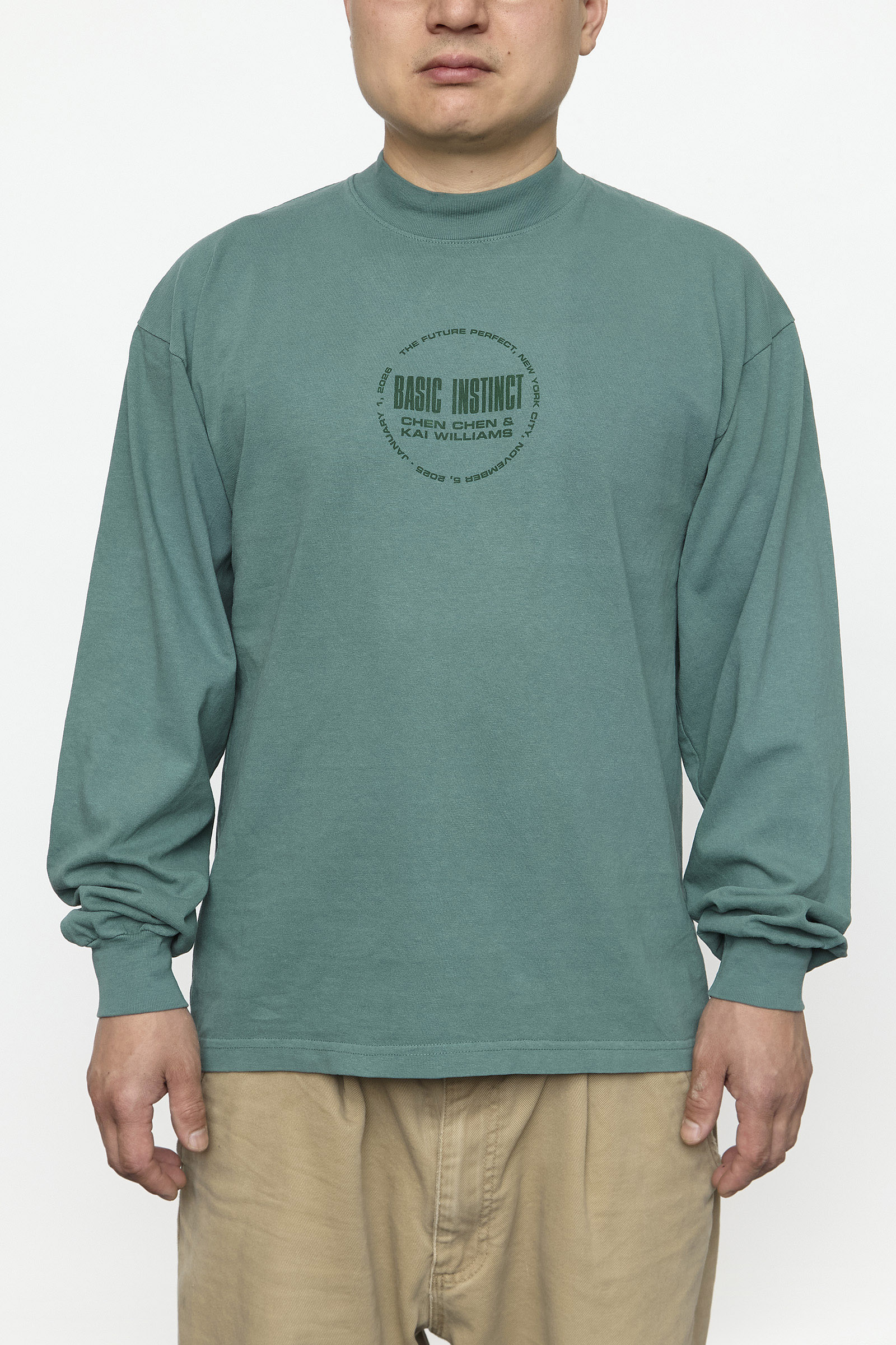 man wearing long sleeve shirt facing forward