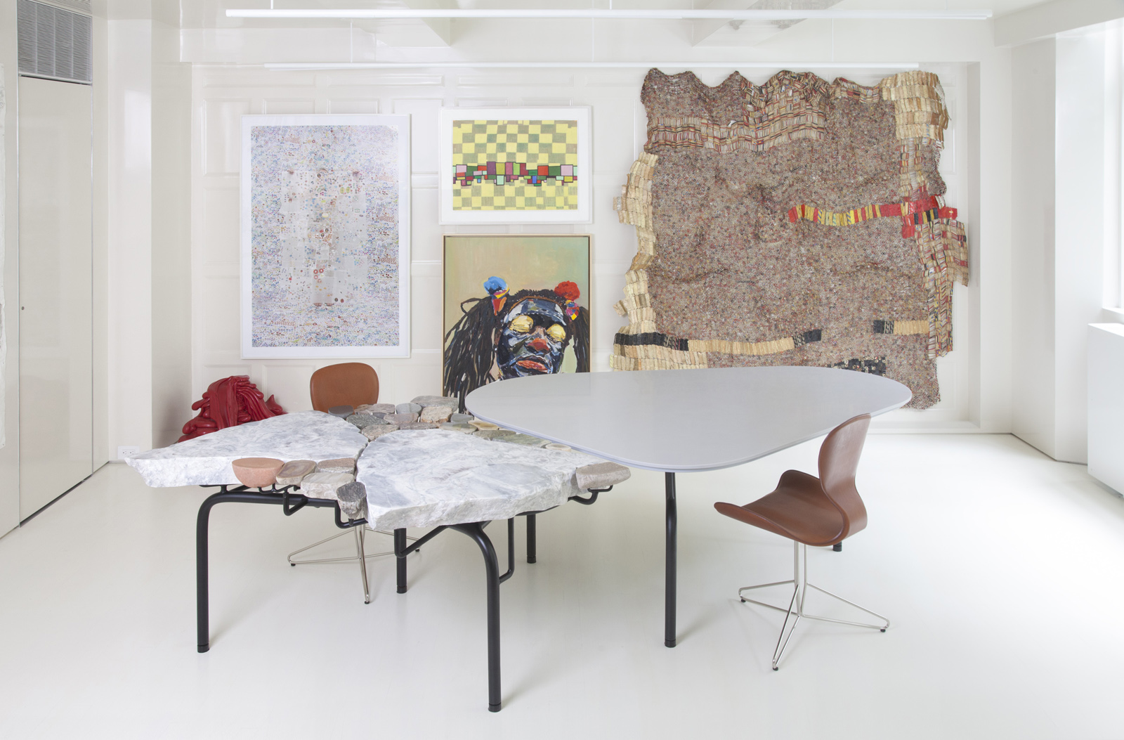 dining table made from slabs of stone with a black metal legs
